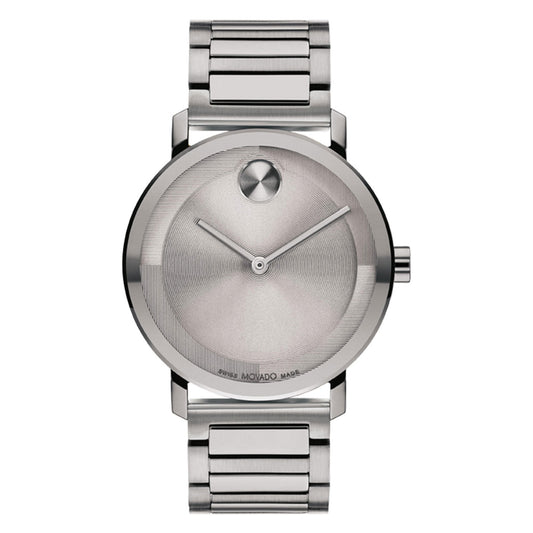 The Movado BOLD 2.0 Quartz 40mm Watch by Movado showcases a minimalist design with a grey ion-plated stainless steel construction. It features a round micro-textured tonal dial, signature dot motif at the 12 o'clock position, sleek watch hands, and a metal link bracelet.