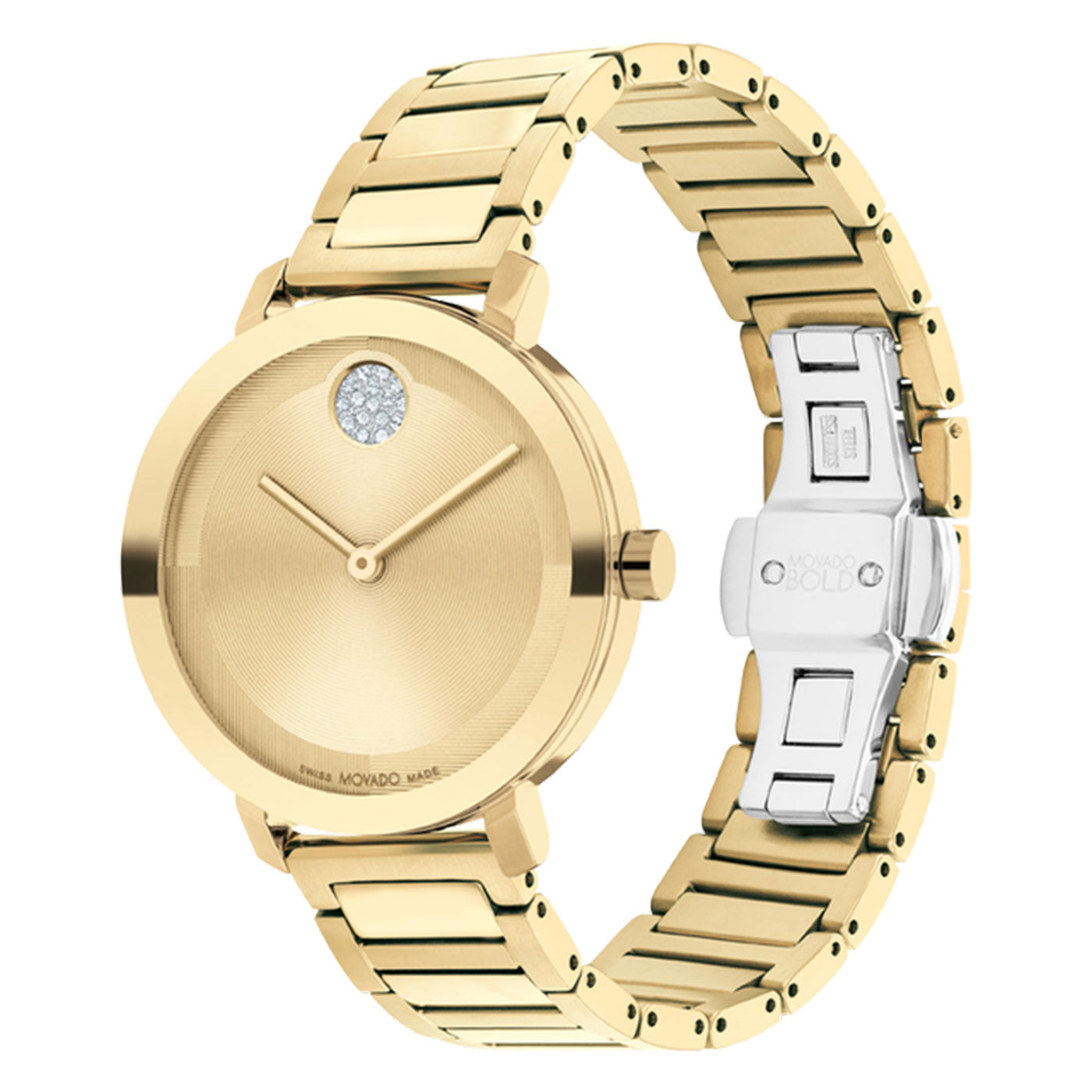 The Movado BOLD 2.0 Quartz 34mm Watch by Movado showcases a minimalist design with a goldtone round dial, slim gold hands, and a single crystal accent at the 12 o'clock mark. Its H-link bracelet in matching gold is elegantly secured by a sleek silver clasp.