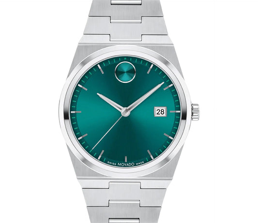 The Movado BOLD Quest Quartz 40mm Watch showcases a green sunray dial with a minimalist design. It features silver hour markers, two hands, a small date window at 3 o'clock, and the iconic signature dot at 12 o'clock. The integrated bracelet is crafted in sleek silver with a brushed finish.