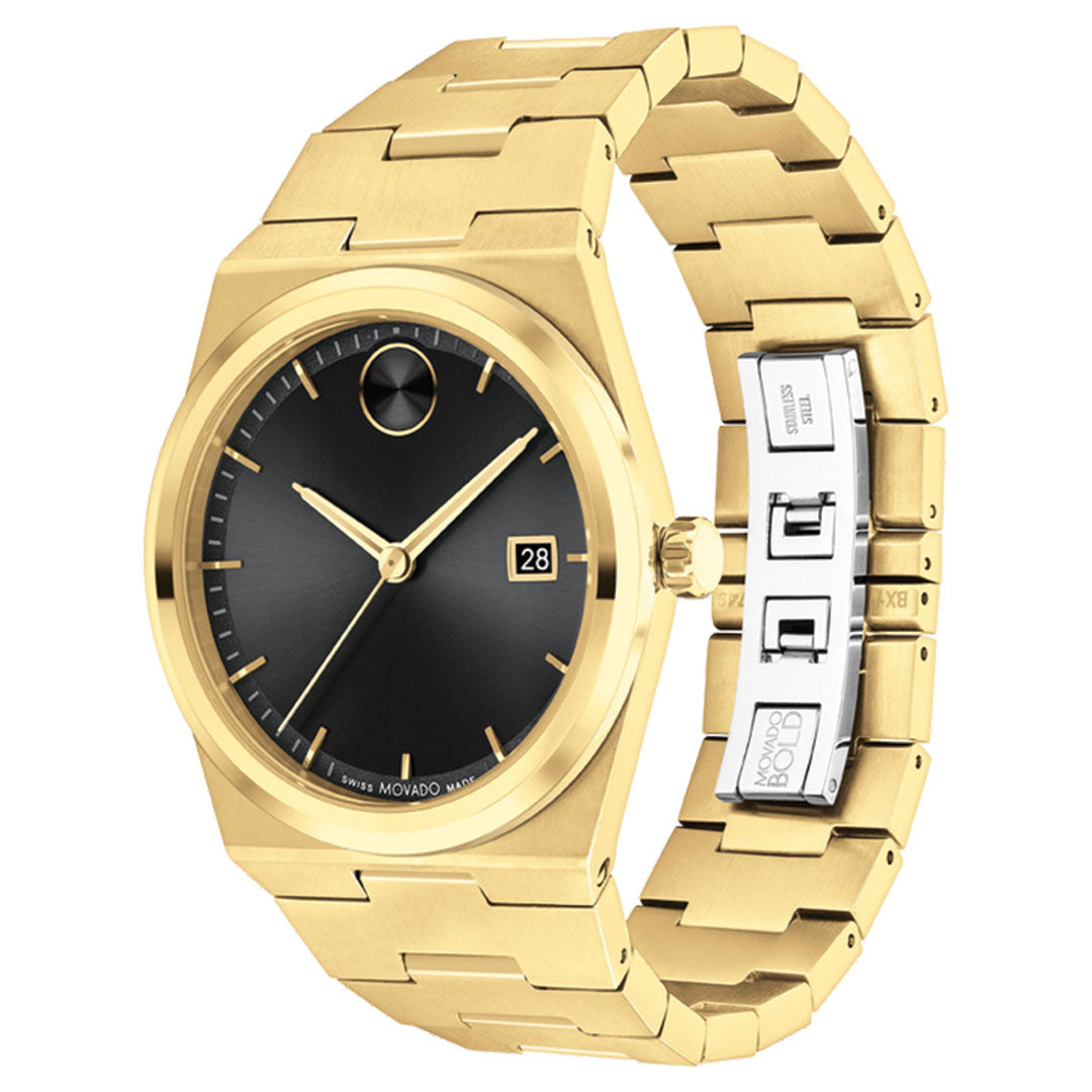 The Movado BOLD Quest Quartz 40mm Watch features a gold case, black sunray dial with minimalist markers, date at 3 o’clock, and a distinctive gold and silver integrated bracelet, displayed on a white background.