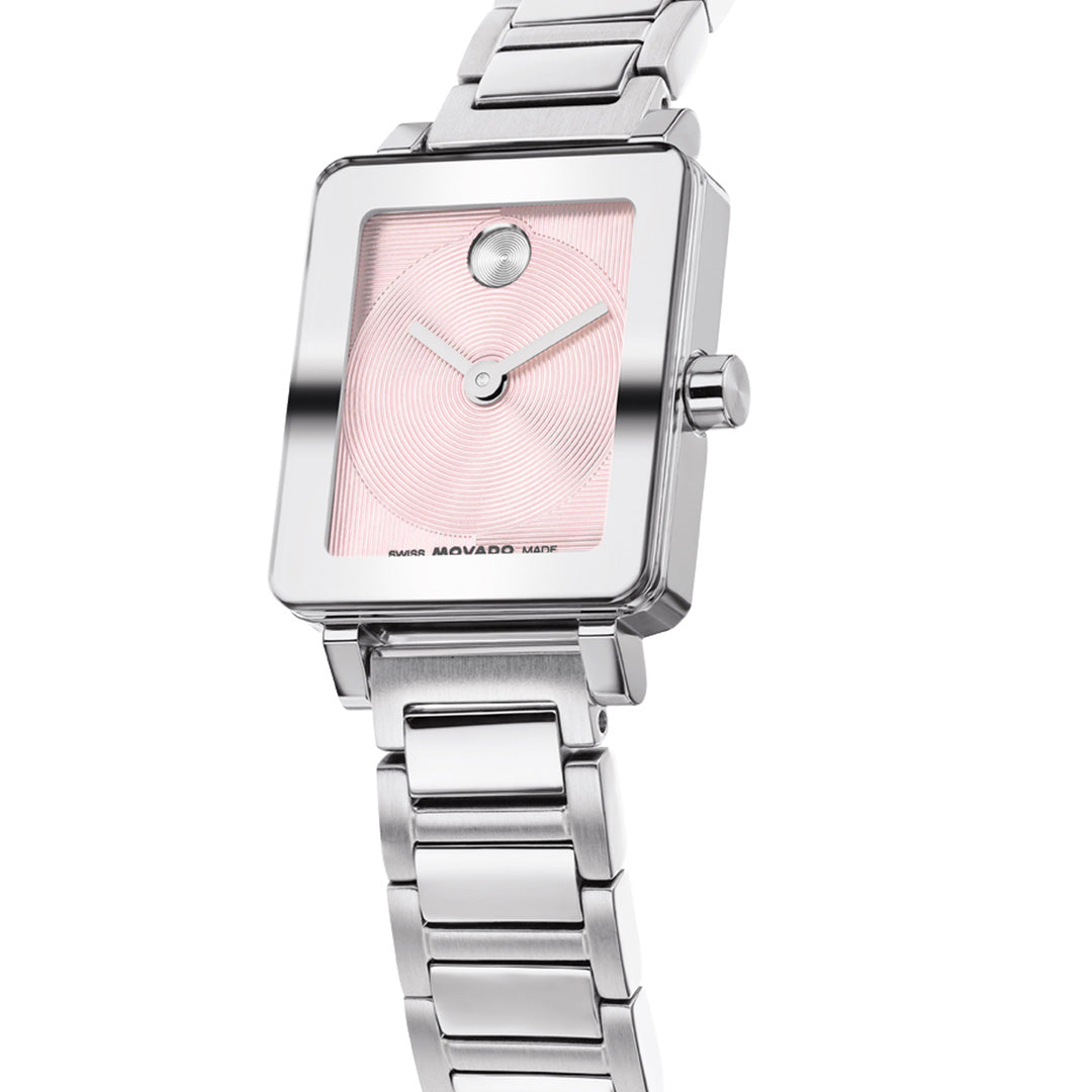 The Movado BOLD Evolution 2.0 Mini Quartz Watch features a silver square stainless steel case (19mm x 22.5mm) with a pink microtextured dial, minimalist design, single dot at the 12 o’clock position, and a sleek metal link band.