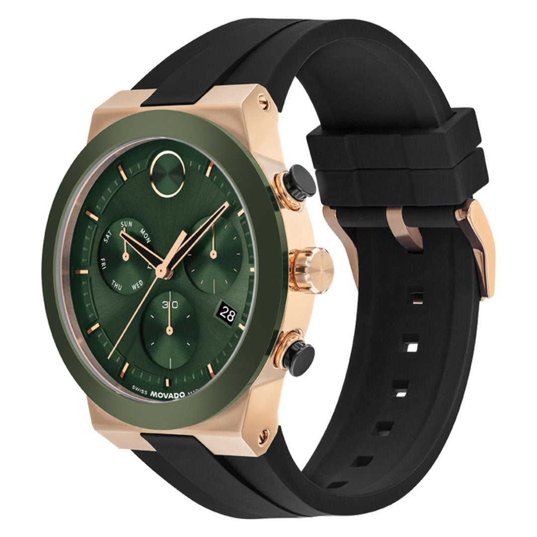 The Movado BOLD Fusion Chronograph Quartz 44.5mm Watch features a green sunray dial with three subdials, gold-tone case, ceramic bezel, date display, black silicone strap, and two pushers plus a crown on the right side.