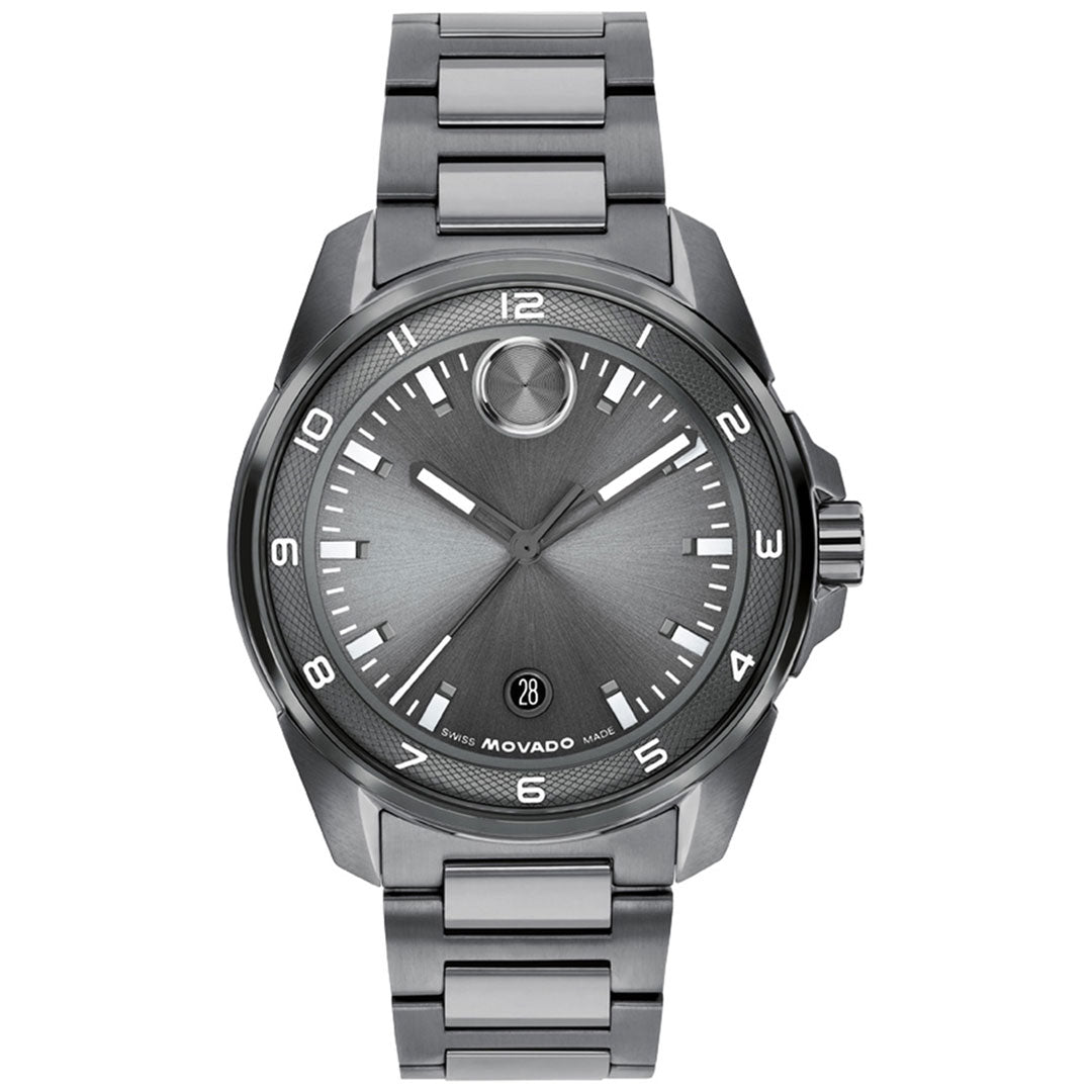 The Movado BOLD Verso S Quartz 42mm Watch by Movado features a stainless steel case with a military grey metallic band and bezel, a minimalist grey dial with the signature dot at 12 o’clock, streamlined hour markers, and a date window at 6 o’clock. This modern timepiece is powered by precise Swiss quartz movement.