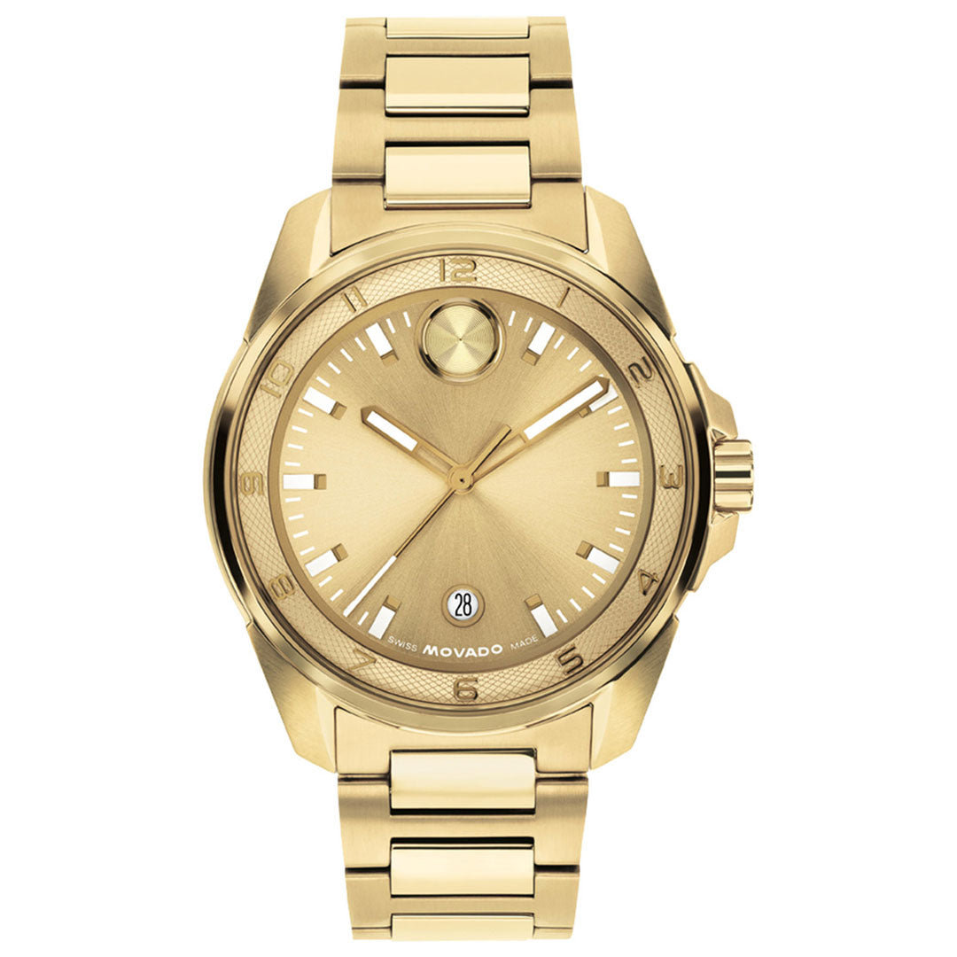 The Movado BOLD Verso S Quartz 42mm Watch features a yellow gold case, metal band, and round dial with minimalist hour markers and a date display at the 6 o’clock position. This elegant sport watch by Movado boasts Swiss-made movement, seamlessly blending classic design with precision craftsmanship.