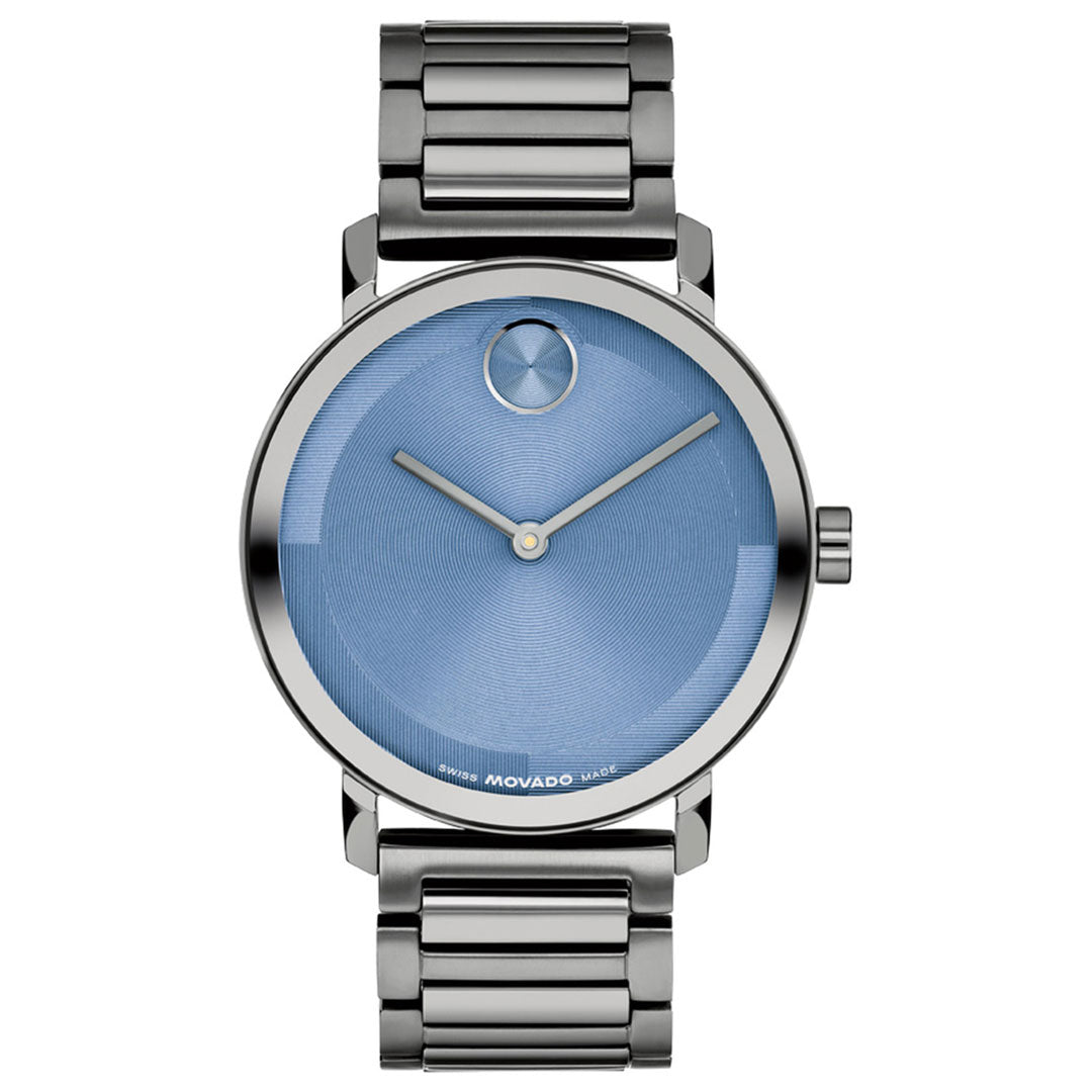 Introducing the Movado BOLD Evolution 2.0 Quartz 40mm Watch: a silver timepiece by Movado featuring a blue micro-textured dial, minimalist design with silver hands and a signature single dot at 12 o’clock, Swiss made quartz movement, and a sleek metal link band—no hour markers for an ultra-modern aesthetic.