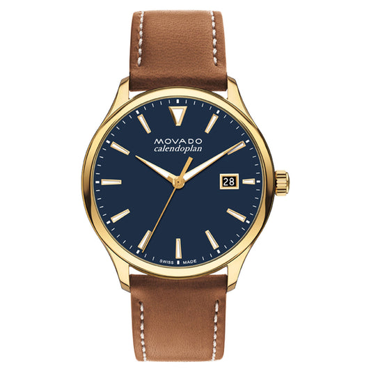 The Movado Heritage Series Calendoplan Solar 40mm Watch embodies mid-century design elegance with its gold bezel, black dial, and white hour markers. It includes a date display at the 3 o'clock position enhanced by Swiss Super-LumiNova® and is complemented by a brown leather strap with white stitching for timeless sophistication.