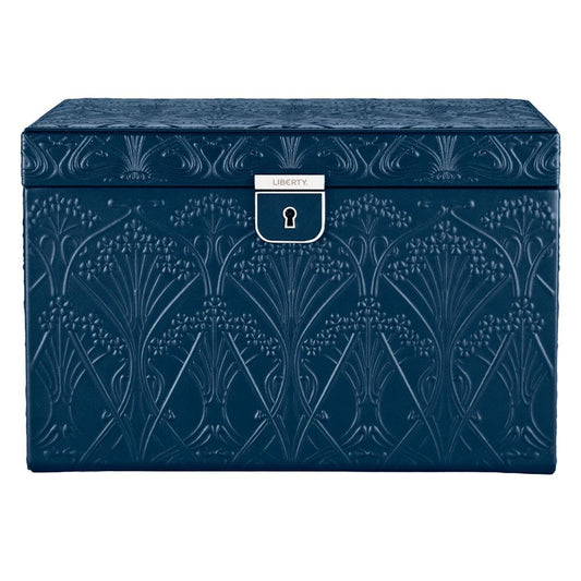 Introducing the WOLF 1834 X Liberty All Over Ianthe Large Jewellery Box in Navy—a beautifully crafted piece featuring intricate floral embossing, a silver-toned clasp engraved with “LIBERTY,” and a central keyhole. Designed by WOLF, this elegant jewellery box not only adds sophistication to your collection but also offers superior tarnish prevention, ensuring your treasures remain safe and radiant.