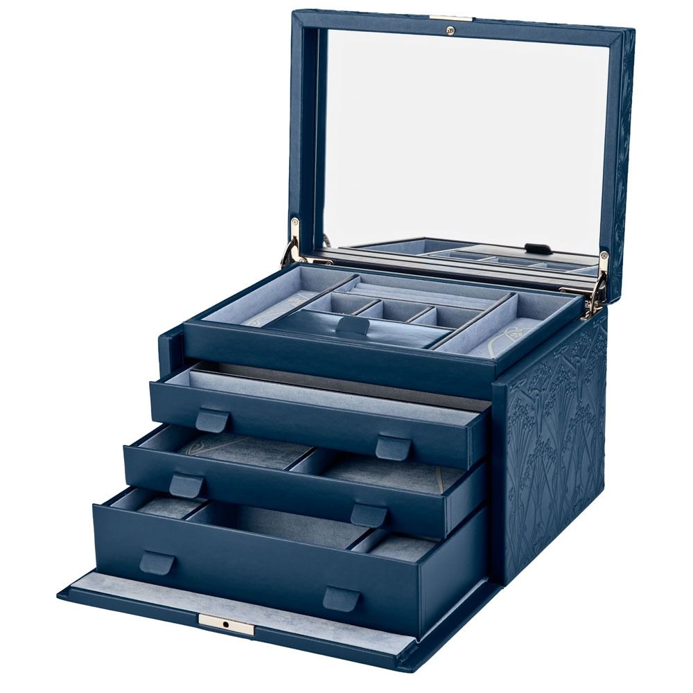 Introducing the WOLF 1834 X Liberty All Over Ianthe Large Jewellery Box in Navy: This elegant jewelry case features a diamond quilted leather exterior for added sophistication and tarnish prevention, along with an open lid that reveals a mirror, multiple compartments, and three pull-out drawers. Each section is lined with soft fabric to securely store your jewelry and keep your treasures looking their best.