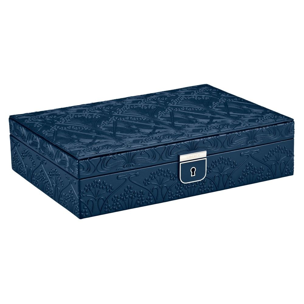 The WOLF 1834 X Liberty All Over Ianthe Medium Jewellery Box Navy, crafted by WOLF, features a rectangular silhouette in dark blue lizard-embossed leather adorned with intricate patterns and is secured with a silver keyhole lock at the front, elegantly displayed against a white background.