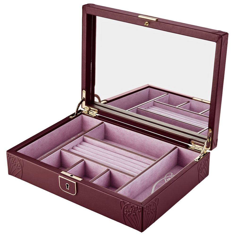 The WOLF 1834 X Liberty All Over Ianthe Medium Jewellery Box in Burgundy is crafted from luxurious lizard-embossed leather and features a mirror inside the lid, multiple soft pink velvet compartments for anti-tarnish jewellery storage, and a secure front lock.