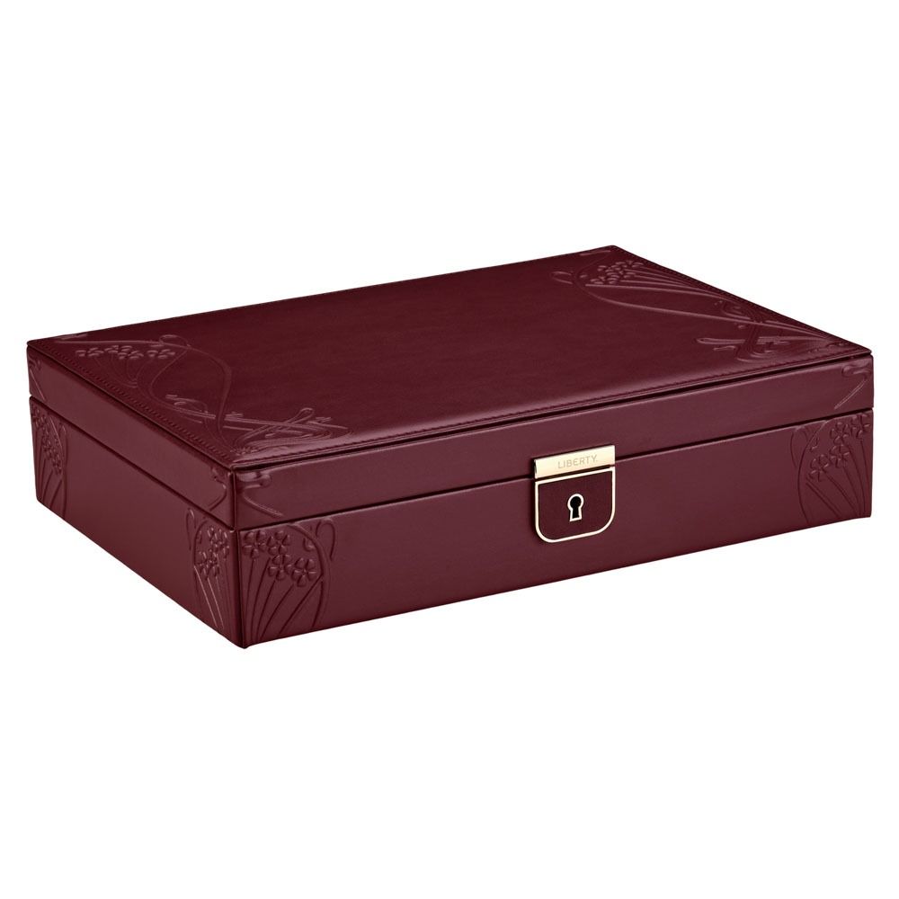 The WOLF 1834 X Liberty All Over Ianthe Medium Jewellery Box in burgundy features lizard-embossed leather with elegant floral Ianthe patterns and a gold clasp with a keyhole. Designed by WOLF for anti-tarnish jewelry storage, this closed rectangular box is displayed on a white background.