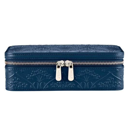 The WOLF 1834 X Liberty All Over Ianthe Medium Jewellery Zip Case in navy features a rectangular embossed leather design with a silver dual zipper on the front and a decorative pattern across its surface, stylishly protecting your accessories on the go.