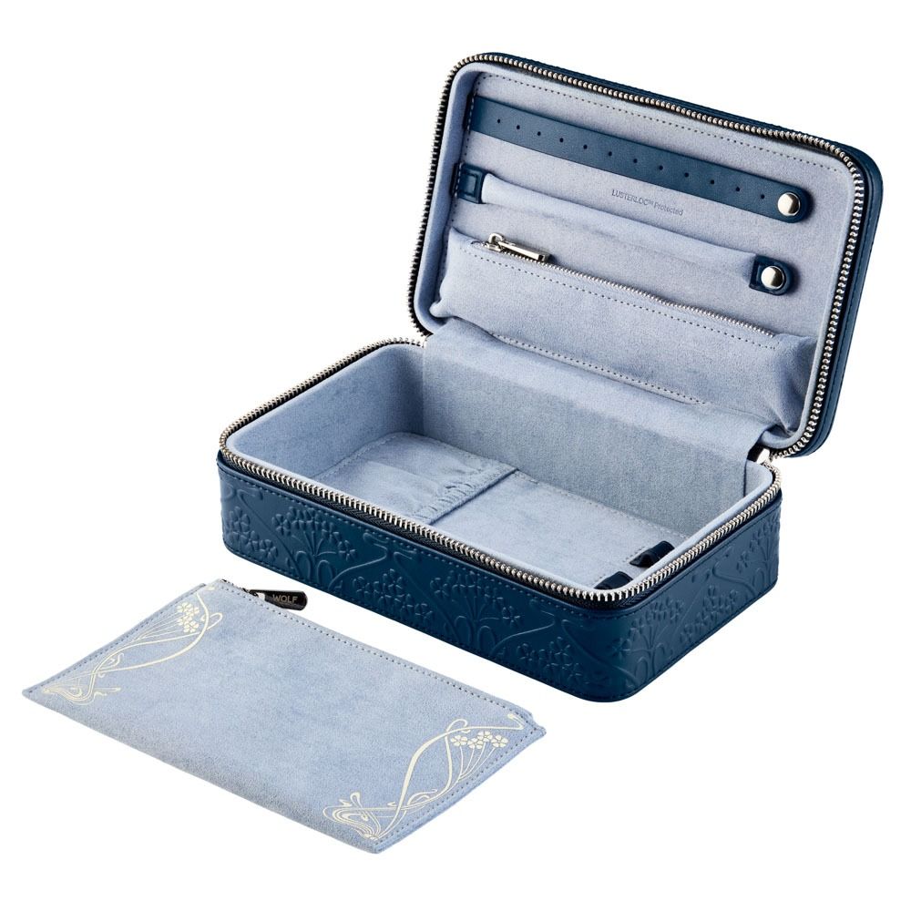 Discover the WOLF 1834 X Liberty All Over Ianthe Medium Jewellery Zip Case in Navy—an elegant blue leather jewelry organizer from WOLF. This travel case features a soft light blue interior, removable pouch with gold detailing, a zipper pocket, and thoughtfully designed sections for organizing your jewelry. The exterior is adorned with embossed floral patterns inspired by Liberty’s iconic Ianthe design.