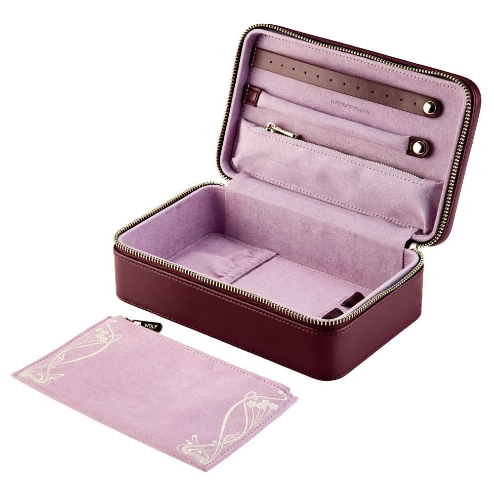 The WOLF 1834 X Liberty All Over Ianthe Medium Jewellery Zip Case in Burgundy is a leather organizer featuring compartments, slots, and a removable soft divider for neatly arranging your accessories; this travel jewelry case also offers anti-tarnish protection to keep your treasures pristine on the go.