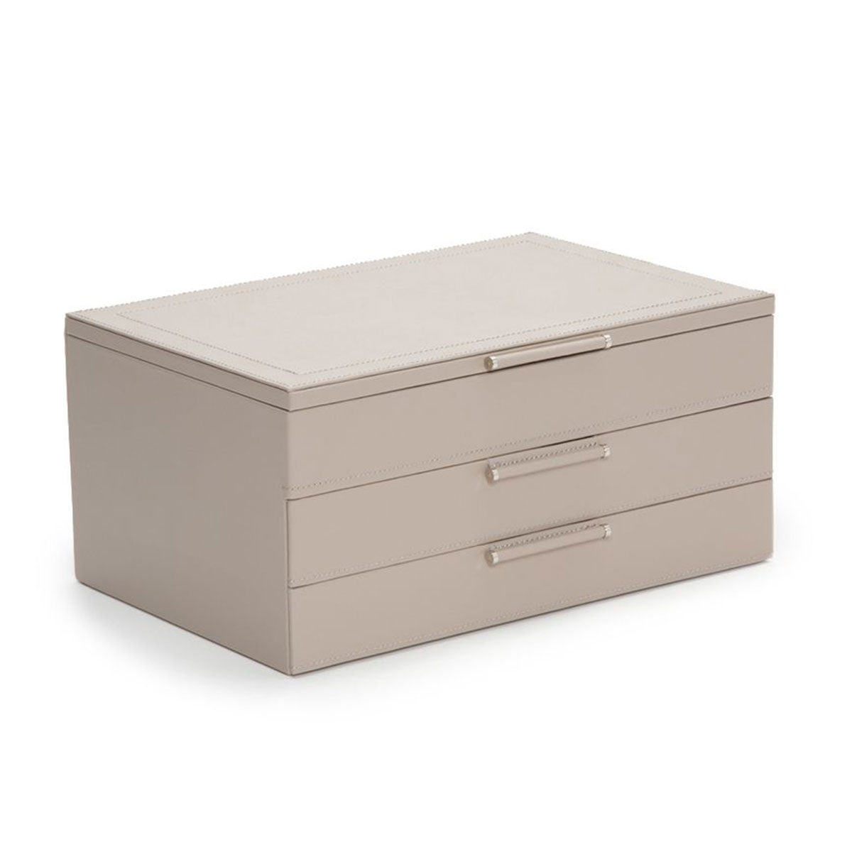 The WOLF 1834 Jewellery Box with Drawers by WOLF is a beige, rectangular box featuring three drawers and sleek handles set against a plain white background. Crafted from sustainable leather, it showcases a minimalist design and includes LusterLoc anti-tarnish lining to safeguard your treasured items.
