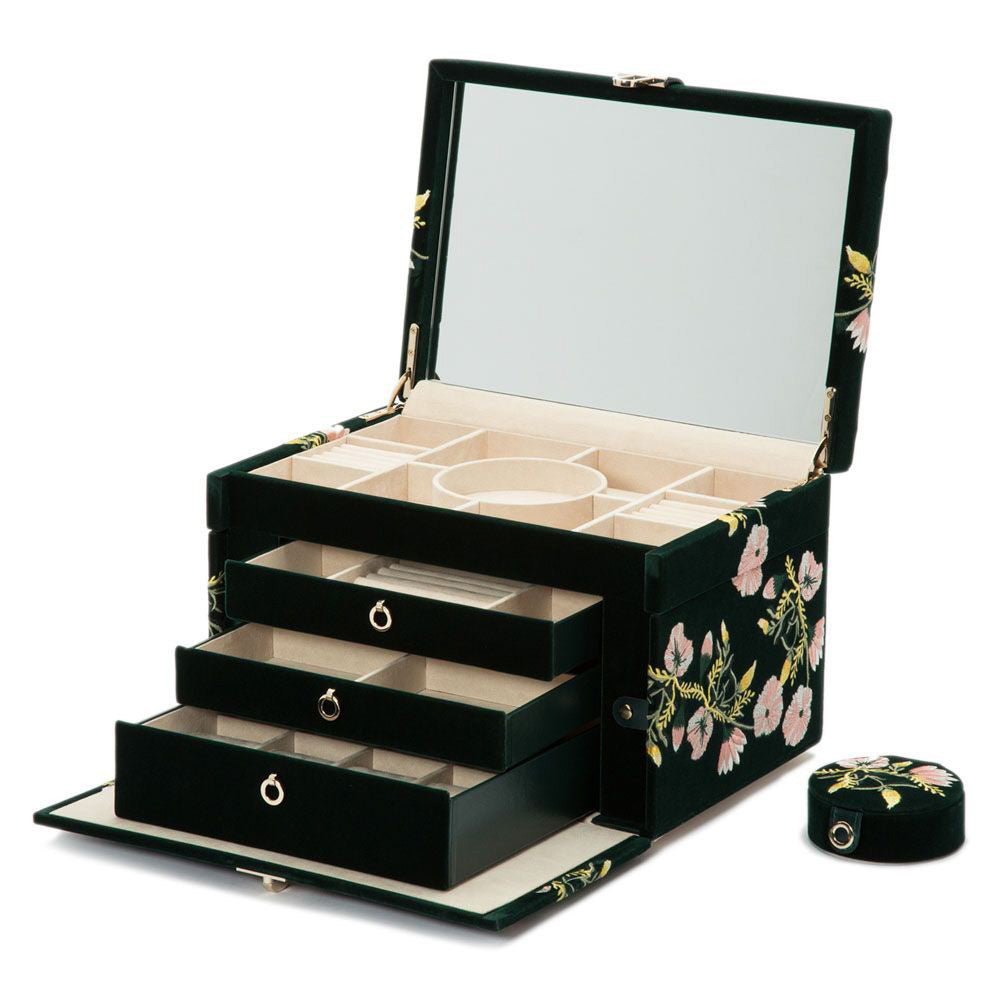 Introducing the WOLF 1834 Zoe Large Jewellery Box: a stylish black box adorned with floral patterns. It features three open drawers, compartments, and a round container for optimal organization of your jewelry collection. The interior is elegantly lined with beige fabric incorporating LusterLoc™ technology to prevent tarnishing, and the lid includes a large mirror for added convenience.