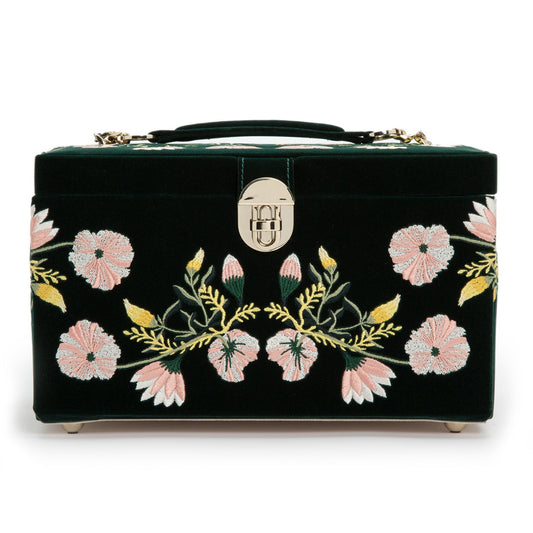 Introducing the WOLF 1834 Zoe Medium Jewellery Box by WOLF, a stunning black velvet jewelry case embellished with intricate pink and white floral embroidery, highlighted by vibrant yellow and green leaves. This exquisite box features a convenient handle on top, a stylish silver clasp in the center, and is lined with premium LusterLoc™ for optimal tarnish prevention to keep your treasures shining bright.