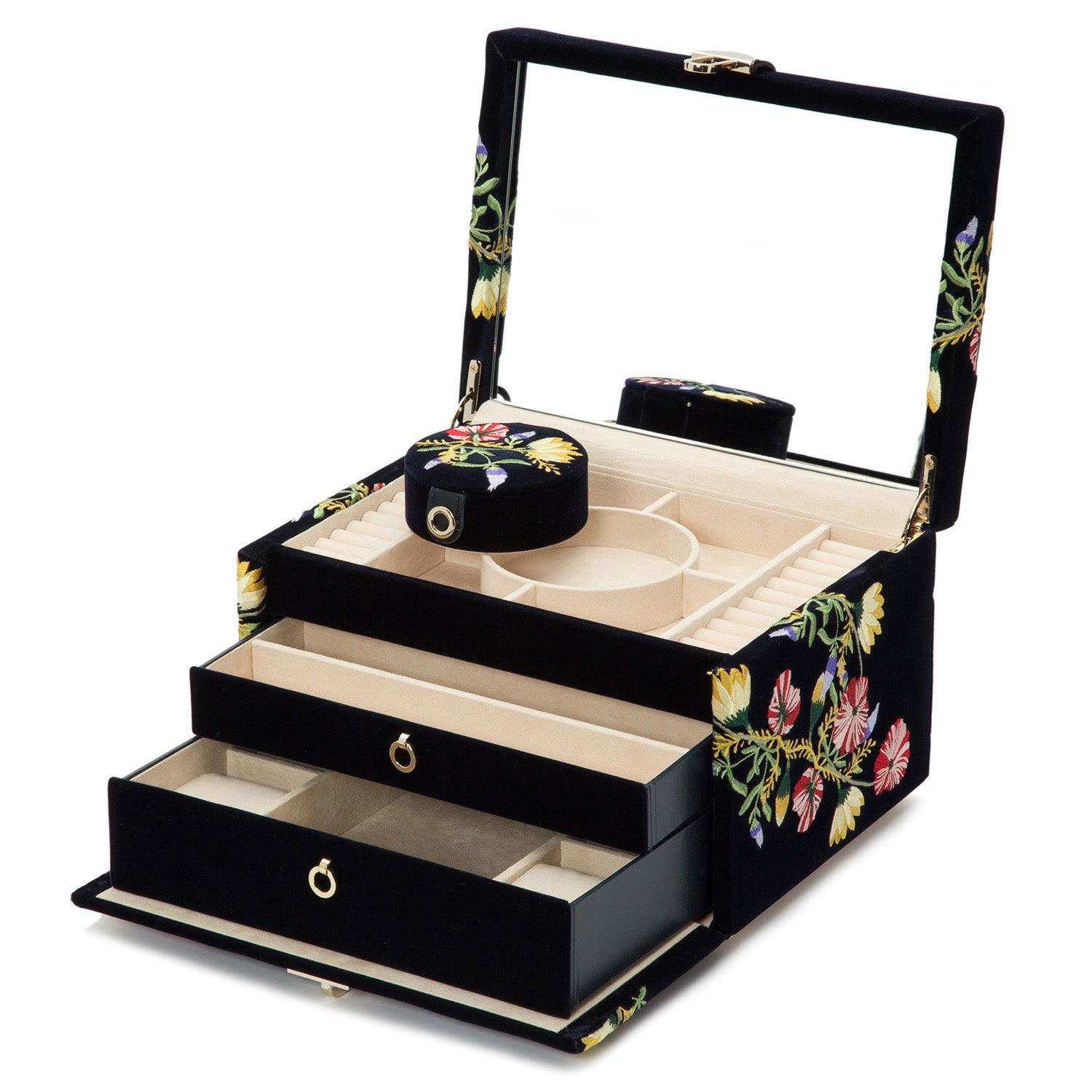 The WOLF 1834 Zoe Medium Jewellery Box, finished in black velvet with floral embroidery, opens to reveal compartments for rings and accessories. It features two drawers and a large mirror inside the lid. With its LusterLoc™ technology, it provides excellent jewelry storage and tarnish prevention.