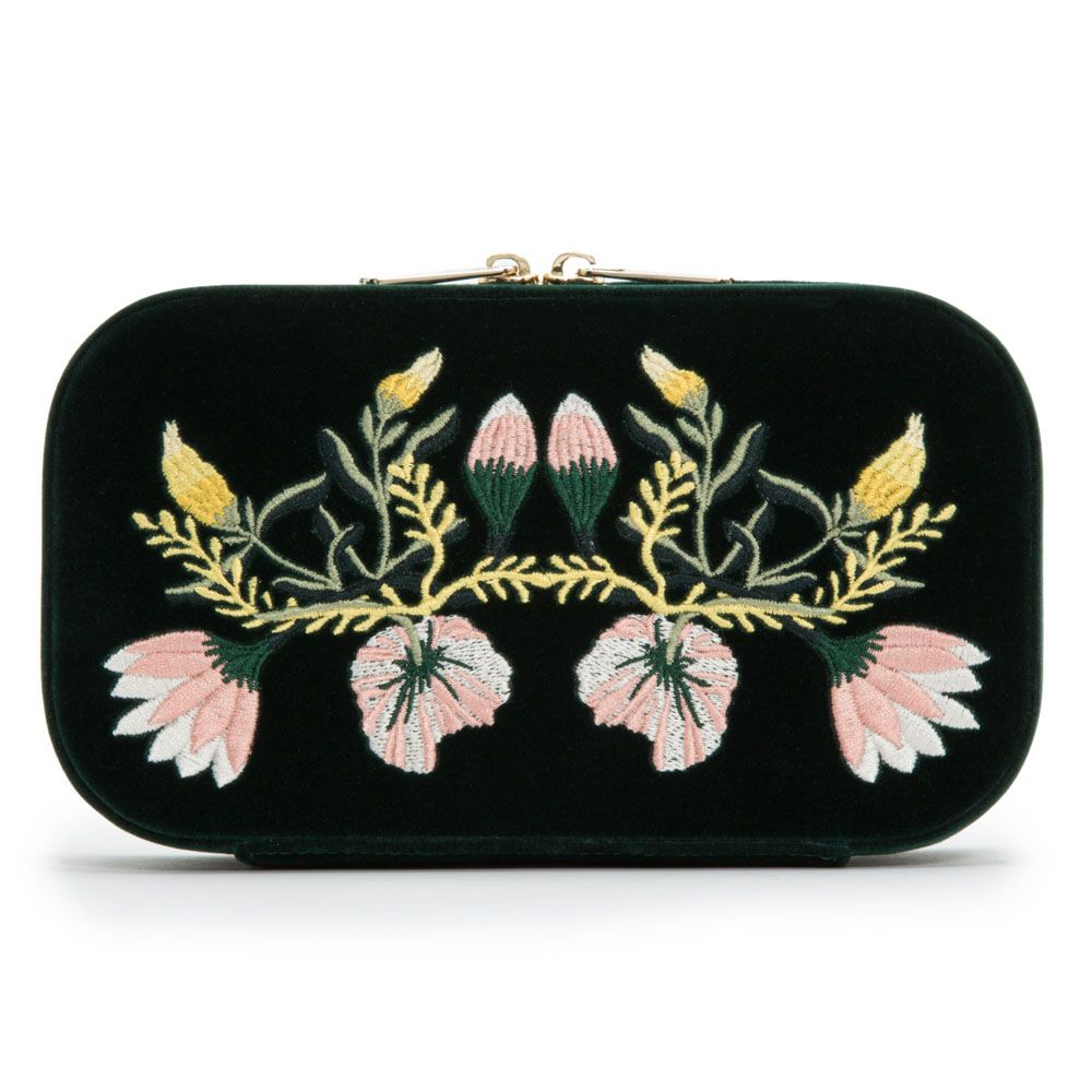 The WOLF 1834 Zoe Travel Zip Case Forest Green by WOLF is an elegant rectangular accessory in a rich forest green shade, featuring a gold zip closure and adorned with embroidered pink flowers, yellow buds, and green leaves arranged in a symmetrical floral pattern on the front. This stylish case doubles as a travel jewelry organizer, providing both beauty and practicality for keeping your treasures safe and organized while on the go.