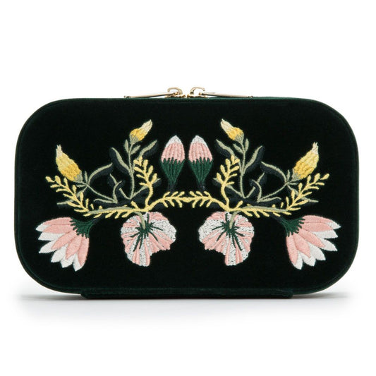 The WOLF 1834 Zoe Travel Zip Case Forest Green by WOLF is an elegant rectangular accessory in a rich forest green shade, featuring a gold zip closure and adorned with embroidered pink flowers, yellow buds, and green leaves arranged in a symmetrical floral pattern on the front. This stylish case doubles as a travel jewelry organizer, providing both beauty and practicality for keeping your treasures safe and organized while on the go.