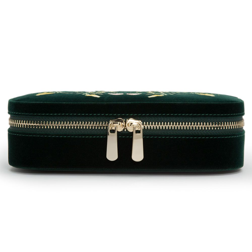 The WOLF 1834 Zoe Travel Zip Case in Forest Green is a rectangular velvet jewelry organizer featuring a gold zipper with two pulls and an embroidered or textured top design, presented here from the front. This elegant accessory by WOLF combines style and functionality, making it the perfect companion for your travels.