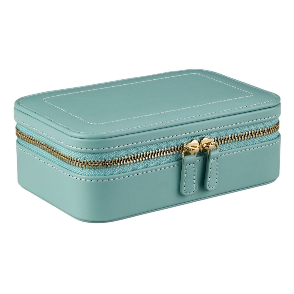 A rectangular, jade-green WOLF 1834 X Fiona Howard Sophia Travel Zip Case featuring botanical-inspired quilting, crisp white stitching, gold double zipper, and softly rounded corners, is crafted from premium leather and shown closed against a white background.