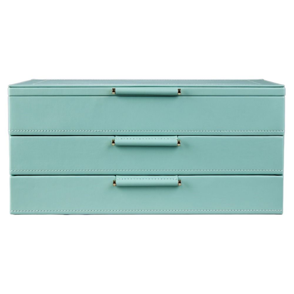 A rectangular, jade blue botanical-themed leather jewellery box from WOLF, designed in collaboration with Fiona Howard. The Sophia Jewellery Box features three drawers, each with a matching handle and white-stitched edges. It is lined with an anti-tarnish fabric to keep your treasures protected and looking their best.