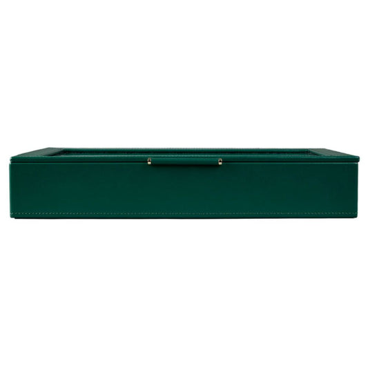 The WOLF 1834 X Fiona Howard Botanical Jewellery Box With Window by WOLF is a rectangular green leather case with white stitching, seen from the front. The box features a gold center handle and a transparent top for display or storage, while its elegant design includes an anti-tarnish lining to help keep your valuables pristine.