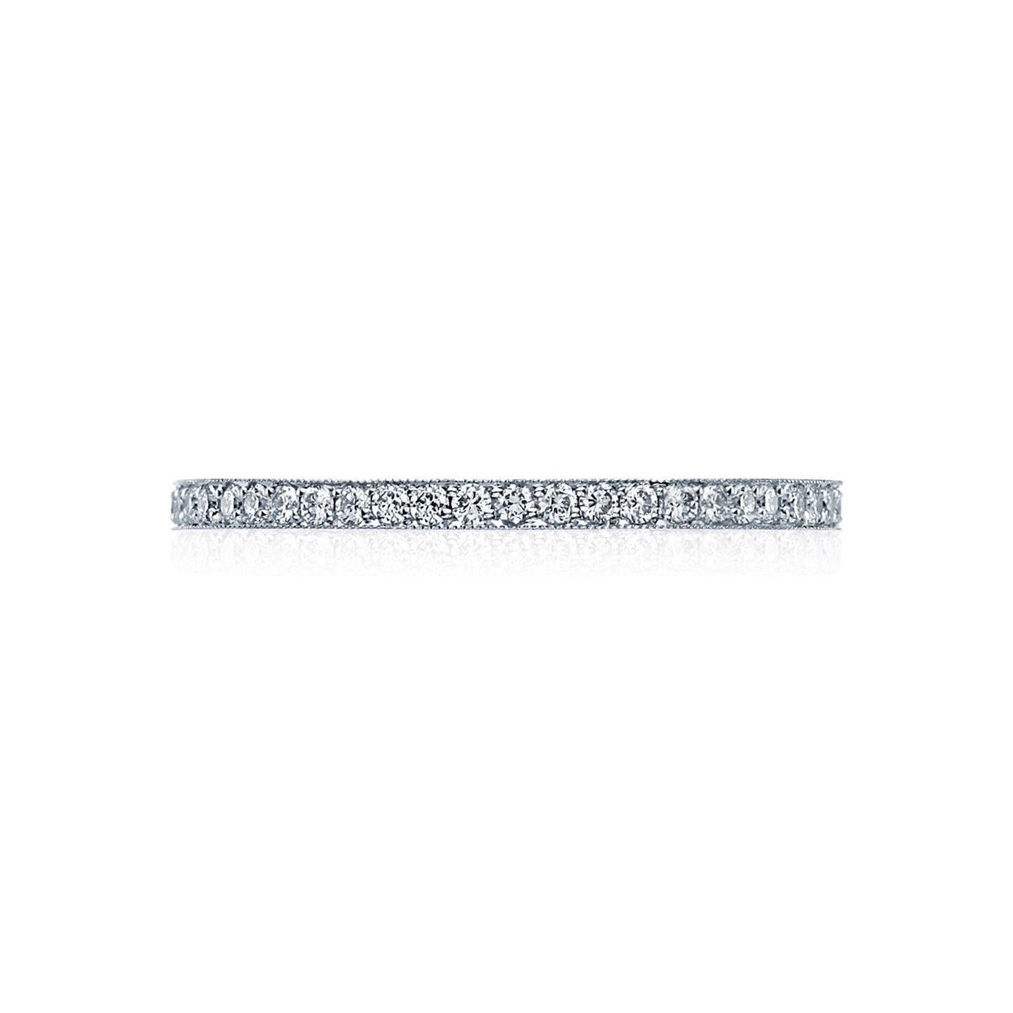 The Tacori Sculpted Crescent Platinum Round Brilliant Pavé Diamond Eternity Ring features a slim, elegant band adorned with a continuous line of small, sparkling diamonds. Perfect for engagement rings, this exquisite piece by Tacori is beautifully showcased on a white background when viewed from the side.