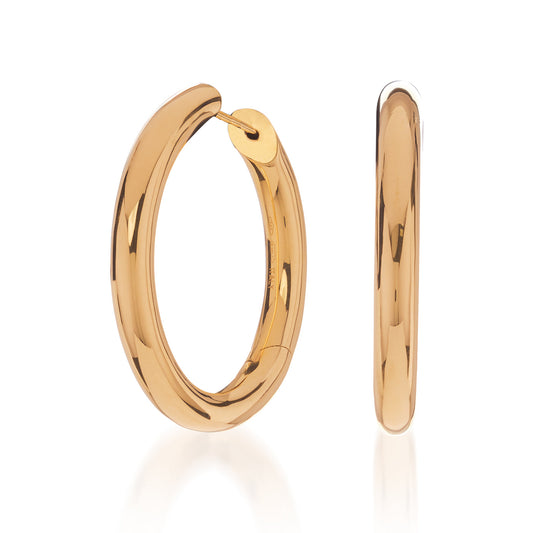 On a white background, the Raffi&Co® 18K Yellow Gold Hoop Earrings are artfully displayed. One earring showcases its front, while the other reveals a side profile. They are expertly crafted in 18K yellow gold with a polished, lustrous finish that exudes elegance and style.