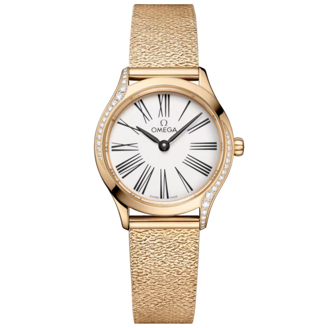 The OMEGA De Ville Mini Tresor Quartz 26mm Watch features an 18K Moonshine™ Gold case, textured gold band, white dial with black Roman numerals, and sparkling diamonds set along one side of its round bezel.