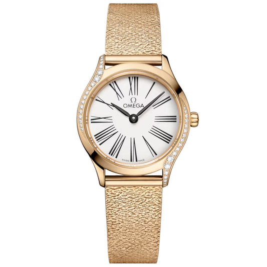 The OMEGA De Ville Mini Tresor Quartz 26mm Watch features an 18K Moonshine™ Gold case, textured gold band, white dial with black Roman numerals, and sparkling diamonds set along one side of its round bezel.