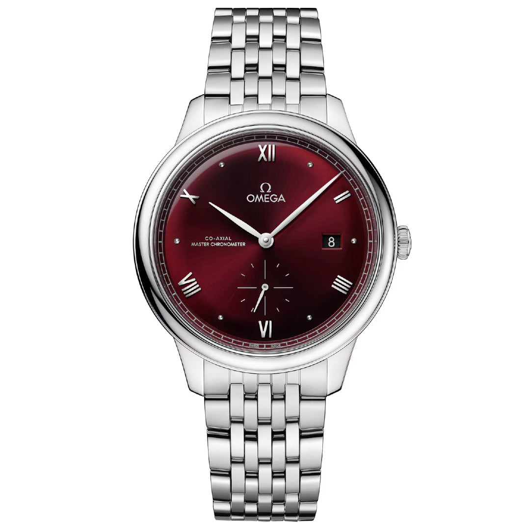 The OMEGA De Ville Prestige Co-Axial Master Chronometer Small Seconds 41mm Watch features a stainless steel case and a silver bracelet, complemented by a rich burgundy dial. The face is adorned with Roman numerals, slender hands, a date window at the 3 o'clock position, and proudly displays the OMEGA logo at the top. This Master Chronometer design exemplifies both elegance and sophistication.