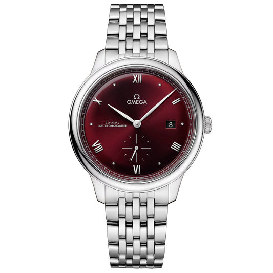 The OMEGA De Ville Prestige Co-Axial Master Chronometer Small Seconds 41mm Watch features a stainless steel case and a silver bracelet, complemented by a rich burgundy dial. The face is adorned with Roman numerals, slender hands, a date window at the 3 o'clock position, and proudly displays the OMEGA logo at the top. This Master Chronometer design exemplifies both elegance and sophistication.