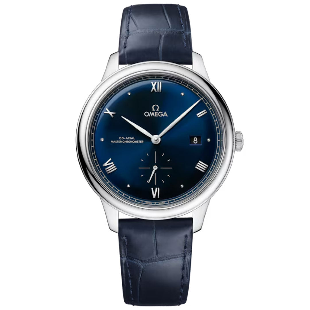 The OMEGA De Ville Prestige Co-Axial Master Chronometer Small Seconds 41mm Watch features a blue dial, silver Roman numerals, date at 3 o’clock, subdial above 6, silver bezel and hands, plus a dark blue leather strap.