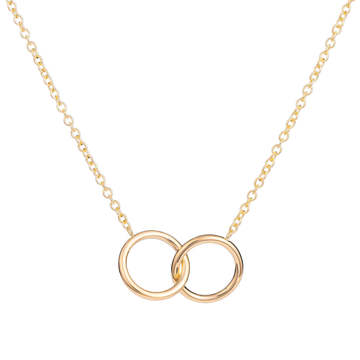 Introducing the Raffi&Co.® 14K Yellow Double Ring Necklace Pendant, a piece that elegantly showcases the timeless beauty of two interlocking rings. Crafted with smooth, polished rings that connect seamlessly and hang from a delicate chain, this necklace embodies simplicity and elegance. Ideal for both daily wear and special occasions, the Raffi&Co double ring necklace is a perfect addition to any jewelry collection.