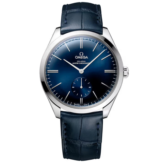 The OMEGA De Ville Tresor Co-Axial Master Chronometer 40mm Watch features a blue gradient dial, stainless steel case, silver hands and markers, small seconds subdial at 6 o’clock, and a dark blue leather strap. Display reads 10:10:36.