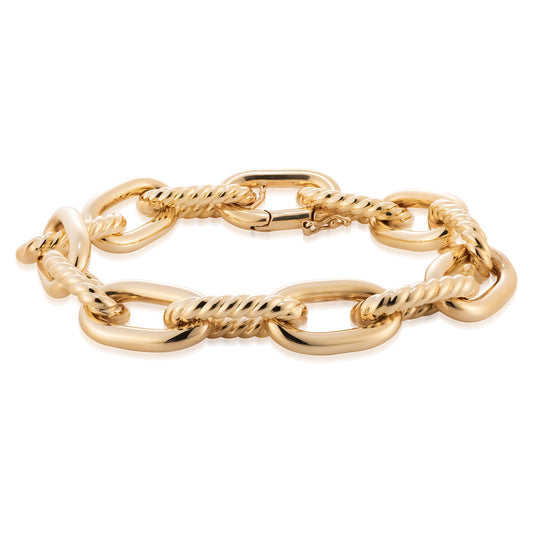 This Raffi&Co® 18K Yellow Gold Bracelet boasts alternating smooth and twisted oval links, complete with a secure clasp closure. The design masterfully combines polished and textured elements, providing a classic yet luxurious elegance.