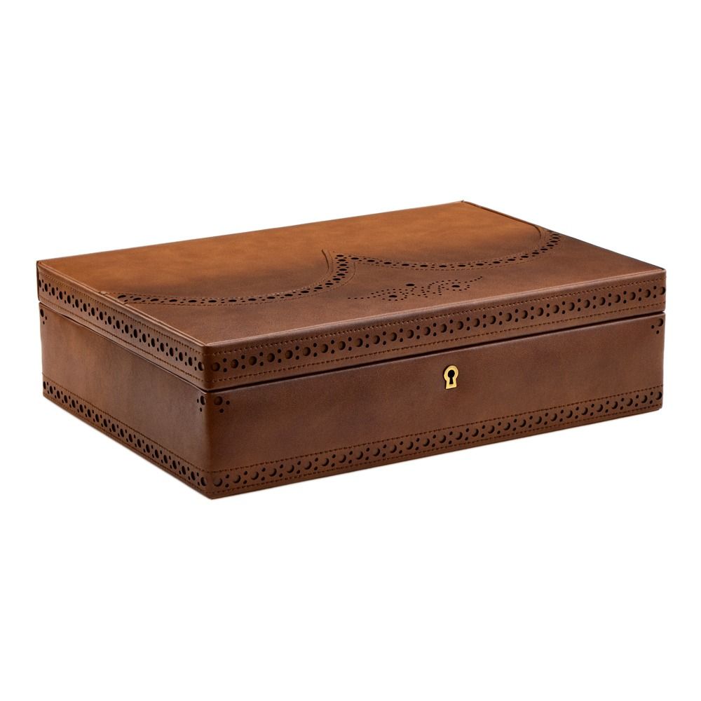 The WOLF 1834 Brogue 10 Piece Watch Box in burnished brown vegan leather, featuring decorative stitching and a small gold keyhole on the front, is displayed on a white background—ideal for stylish watch storage.