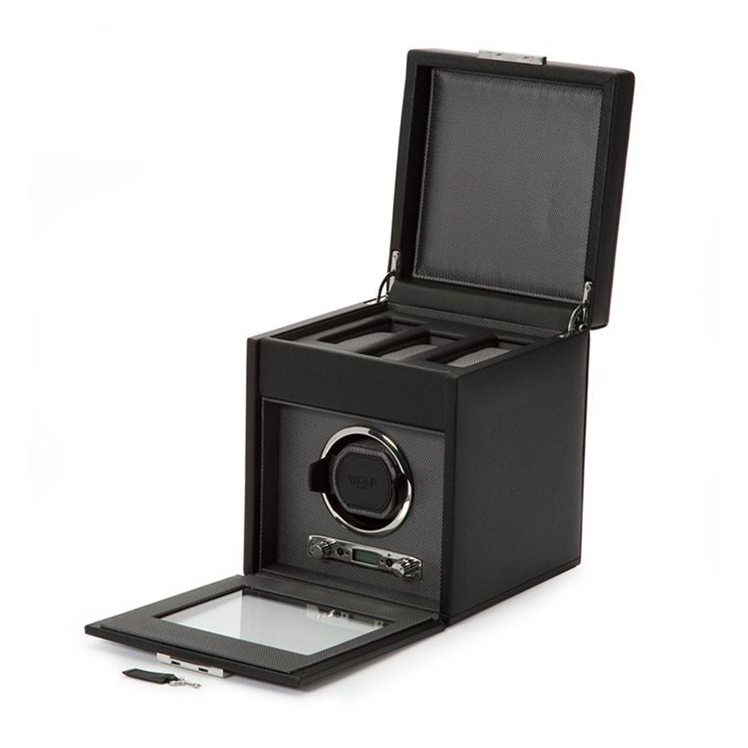 The WOLF 1834 Viceroy Single Winder with Storage is a stylish black leather watch winder box by WOLF, offering an open lid design that showcases several slots for your cherished watches along with a single watch winder mechanism. A small key accompanies this indispensable accessory.