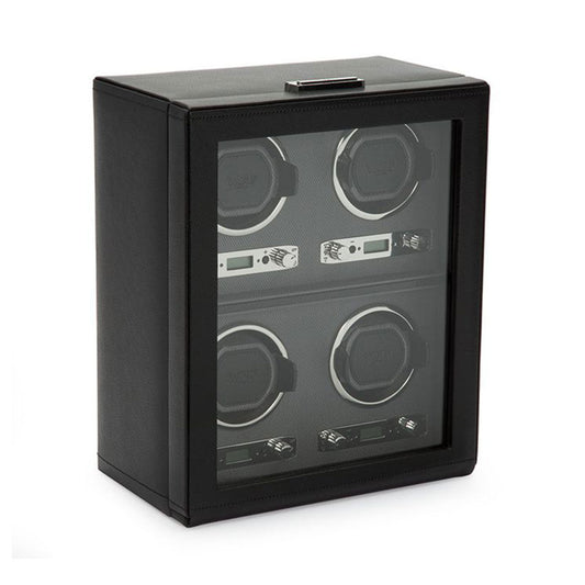 The WOLF 1834 Viceroy Black Watch Winder by WOLF showcases a sleek black leather design with a glass front, featuring four compartments. It's a modern classic, with each watch holder ensuring your automatic timepieces are accurately wound and ready to wear.