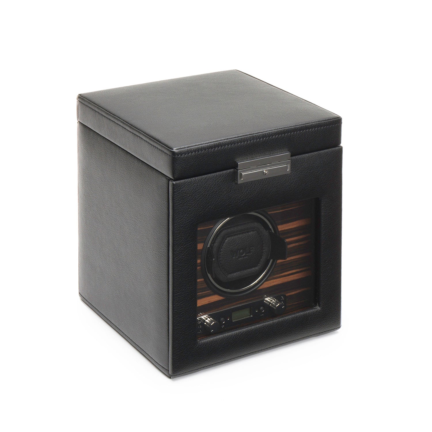 The WOLF 1834 Roadster Single Watch Winder with Storage is elegantly crafted from black vegan leather, featuring a transparent front panel that highlights its single watch holder. Its rectangular design is enhanced by a top metal clasp, embodying the patented innovation in style and functionality that WOLF is known for.