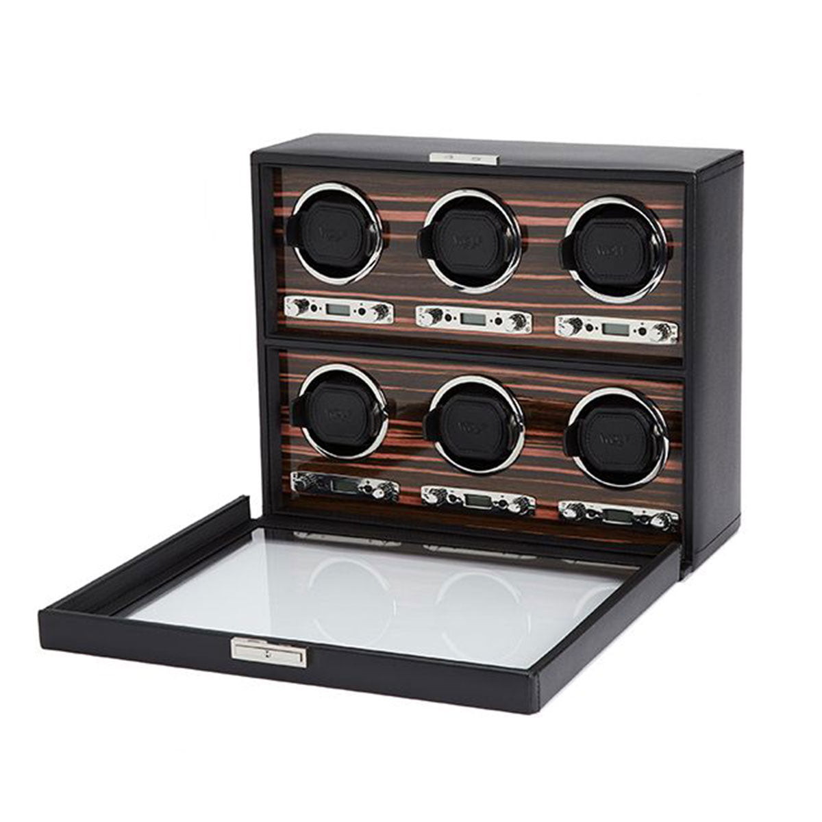 The WOLF 1834 Roadster 6 Piece Winder, crafted in a striking ebony macassar stripe, includes six circular compartments. This watch winder by WOLF is designed to hold and efficiently wind automatic watches with its bi-directional setting, and is shown with an open glass lid.