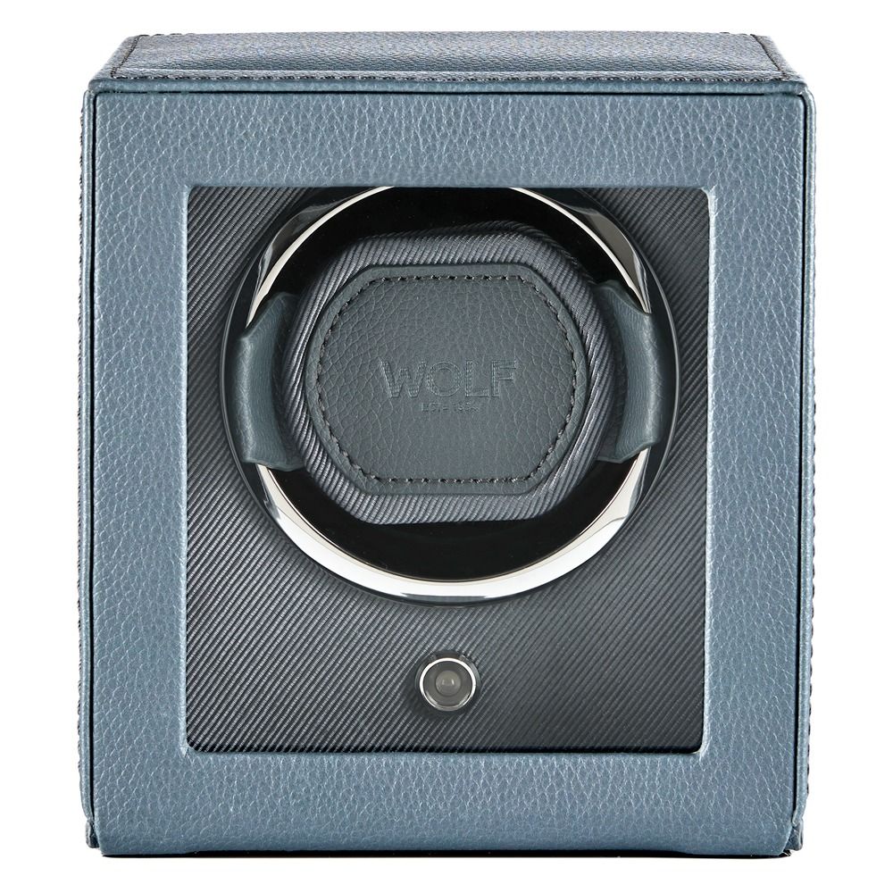 A grey vegan leather watch winder with a glass front, featuring the brand “WOLF” inside and a circular holder for a watch; this is the WOLF 1834 Cub Single Watch Winder Grey.