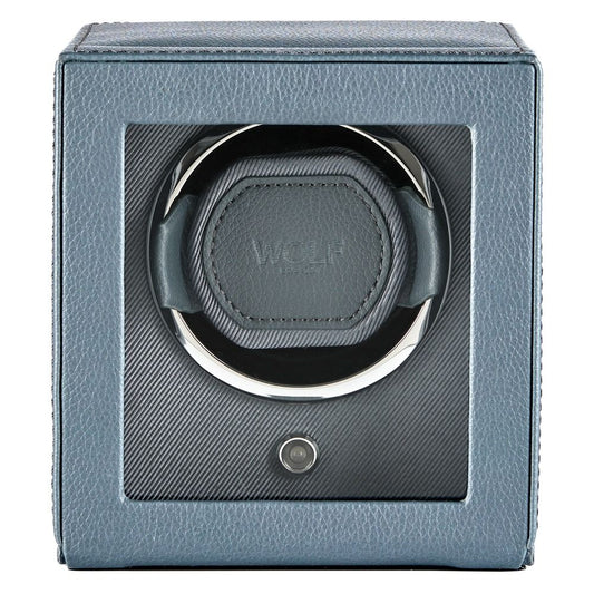 A grey vegan leather watch winder with a glass front, featuring the brand “WOLF” inside and a circular holder for a watch; this is the WOLF 1834 Cub Single Watch Winder Grey.