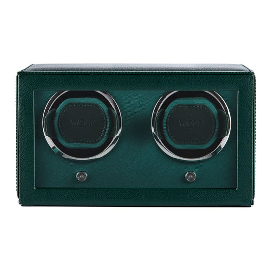 Introducing the WOLF 1834 Cub Double Winder with Cover in Green: a rectangular watch winder box by WOLF, crafted from premium vegan leather. Viewed from the front, it features two circular watch holders and a glass front panel. Its patented rotation technology ensures your timepieces are always ready to wear.
