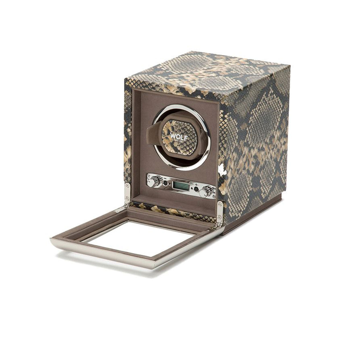 The WOLF 1834 Exotic Single Watch Winder showcases its rotating mechanism as its front door opens, revealing a sleek square design wrapped in top grain cowhide leather. The digital control panel at the bottom ensures precise rotations, keeping your timepieces running smoothly.