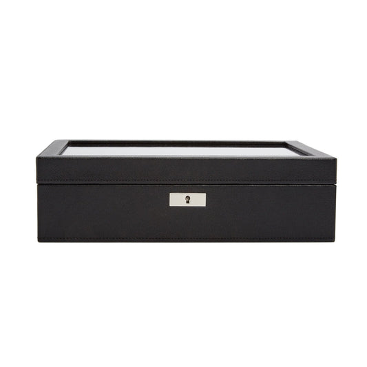 The WOLF 1834 10 Piece Watch Box by WOLF is a sleek and stylish rectangular storage solution made from black vegan leather, featuring a transparent glass lid and a metallic lock on the front. Ideal for organizing and displaying your watch collection, it blends elegance with practicality effortlessly.