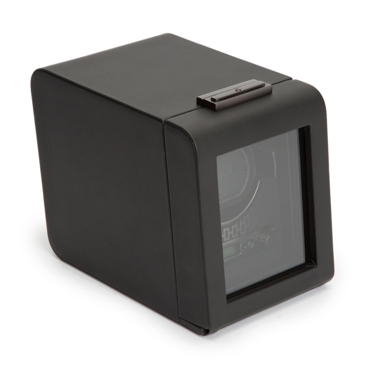 The WOLF 1834 Axis Single Watch Winder, in black with a glass front, elegantly displays an interior crafted to hold a watch. Its modern rectangular design includes a lock-in dynamic cuff, showcasing the visible mechanism through the transparent panel and providing versatile rotation options for optimal watch care.