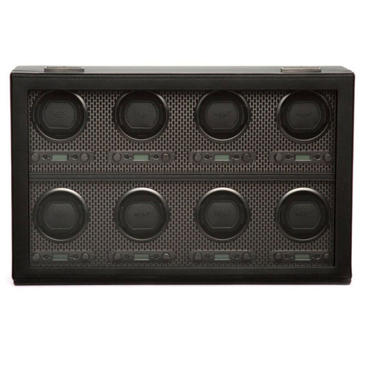 The WOLF 1834 Axis 8 Piece Winder by WOLF features a sleek black case with a grid-patterned front, housing eight circular slots arranged in two rows. Each slot is equipped with patented technology to ensure your automatic watches remain powered and ready for wear.